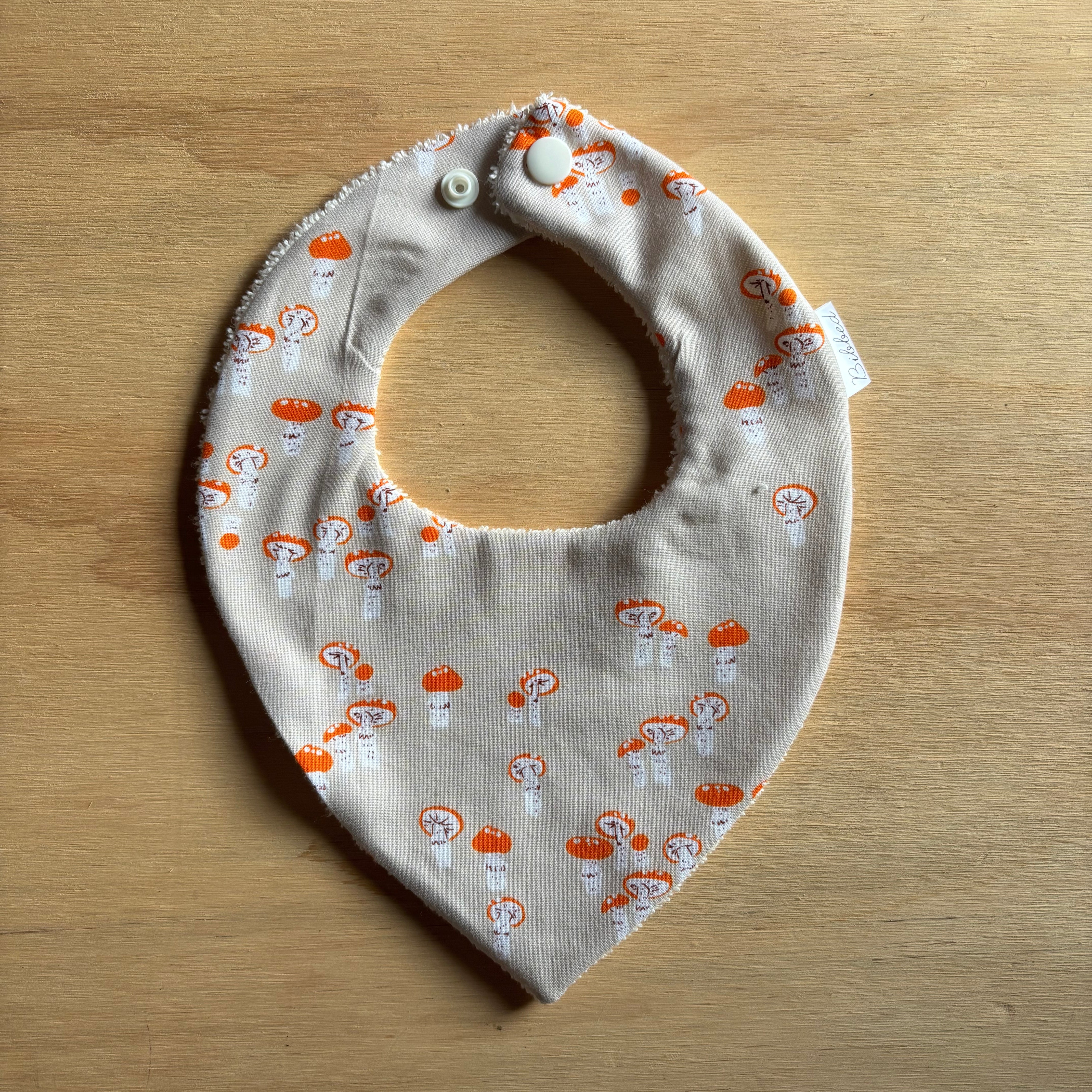 Mushrooms Orange Dribble Bib